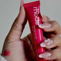 Hydrating rosy pink lip tint Rhode Guava Spritz