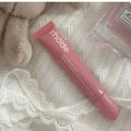 Buildable pink glossy lip tint Rhode Peptide